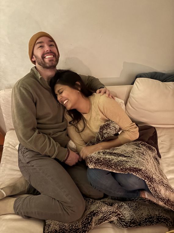 Laughing together on Nat and Katty’s couch